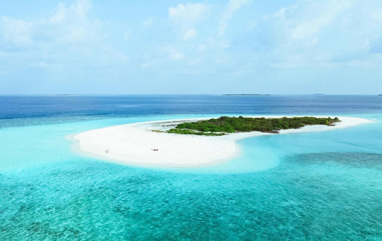 The Standard, Huruvalhi Maldives (Adults Only) Meedhoo  Esterno foto A small island in Maldives