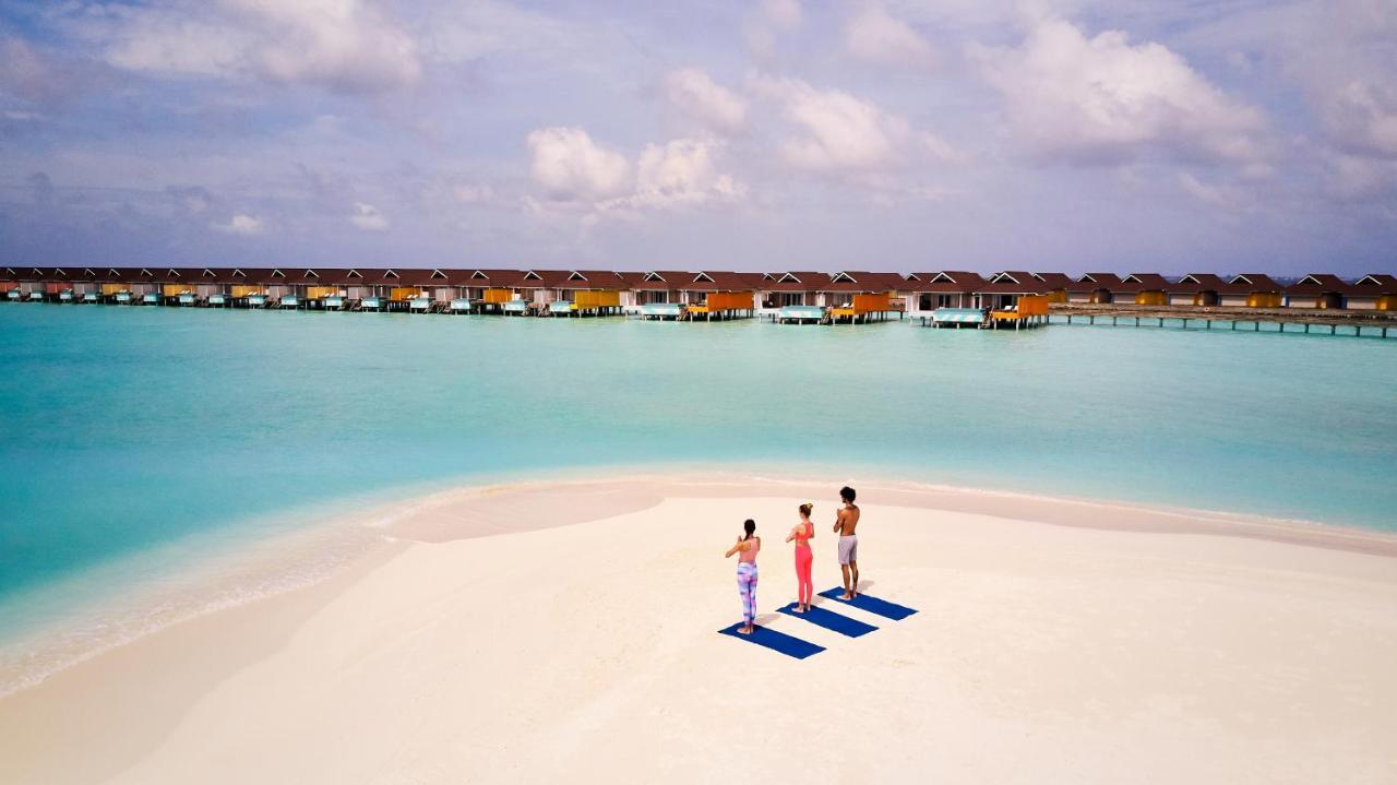 The Standard, Huruvalhi Maldives (Adults Only) Meedhoo  Esterno foto The Maldives is a popular tourist destination for yoga.